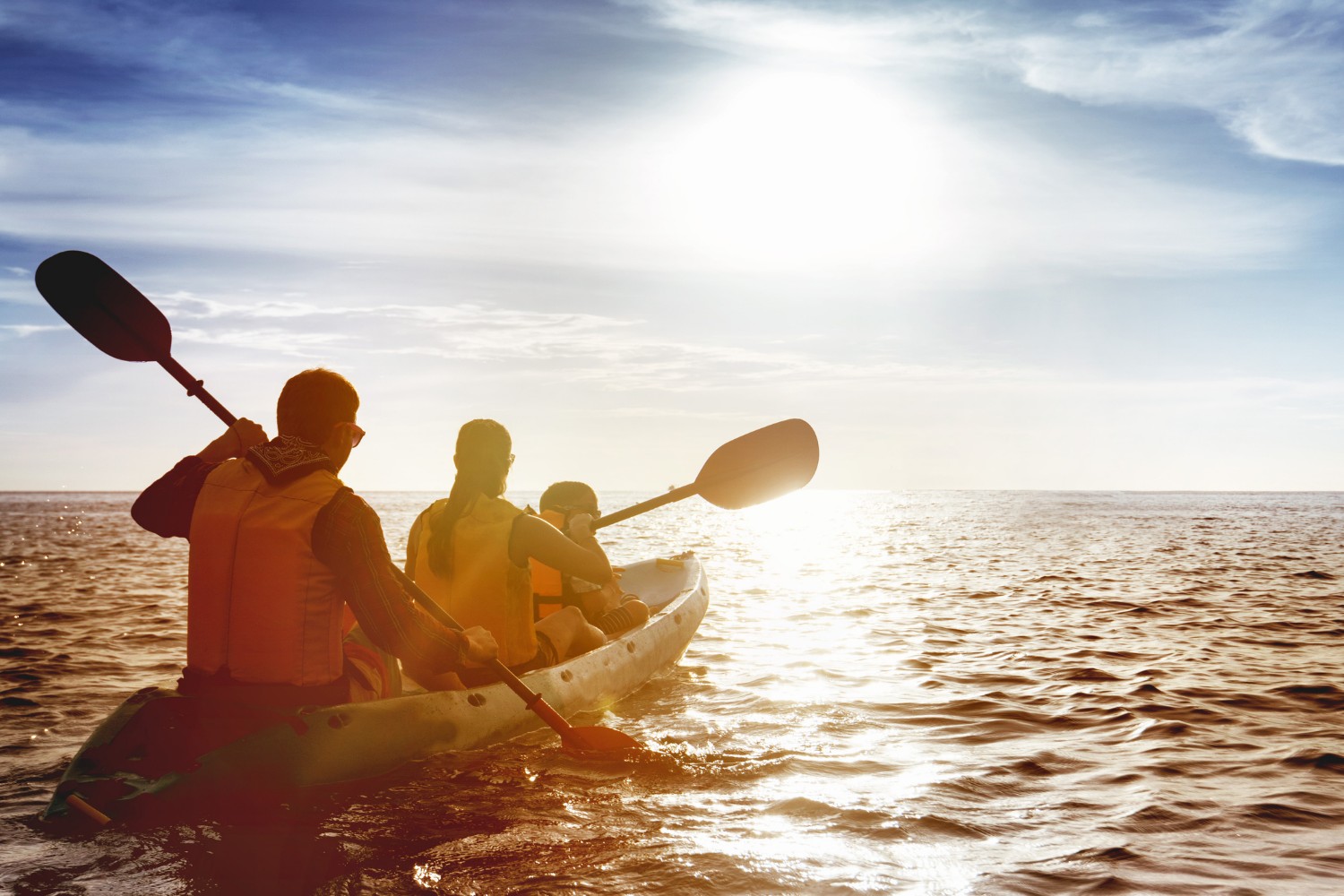 family kayaking outer banks