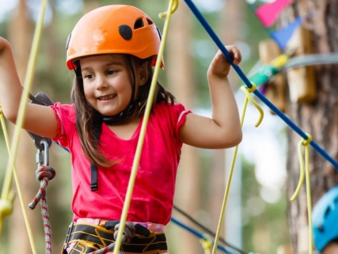 little girl having fun at corolla adventure park