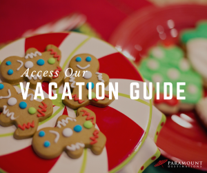 Christmas gingerbread cookies on a plate. text reads access our vacation guide