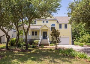 exterior of Outer Banks vacation rental surrounded by trees