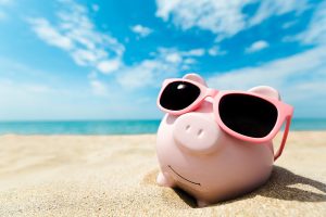 piggy bank on the beach