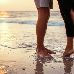 Couple in love on the sunrise sea side