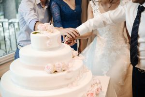 Cutting a cake at a wedding