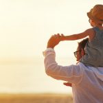 activities ideal for an unforgettable father's day, father and son on beach, outer banks