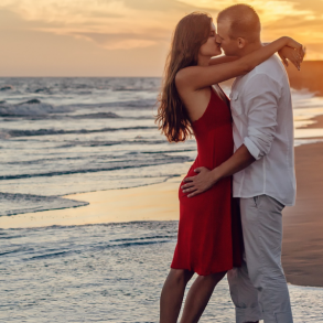 couple kissing on the beach