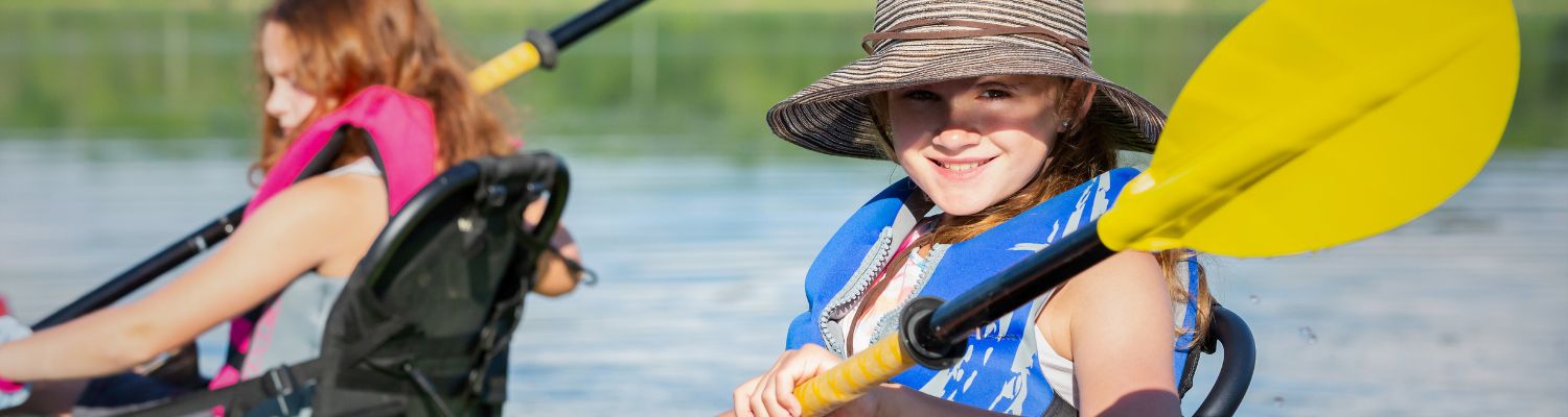 young girls kayaking