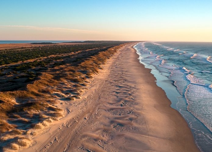 Aerial view of coastline and sand dunes in Outer Banks, North Carolina