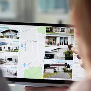 couple looking at vacation rentals online as they plan a vacation