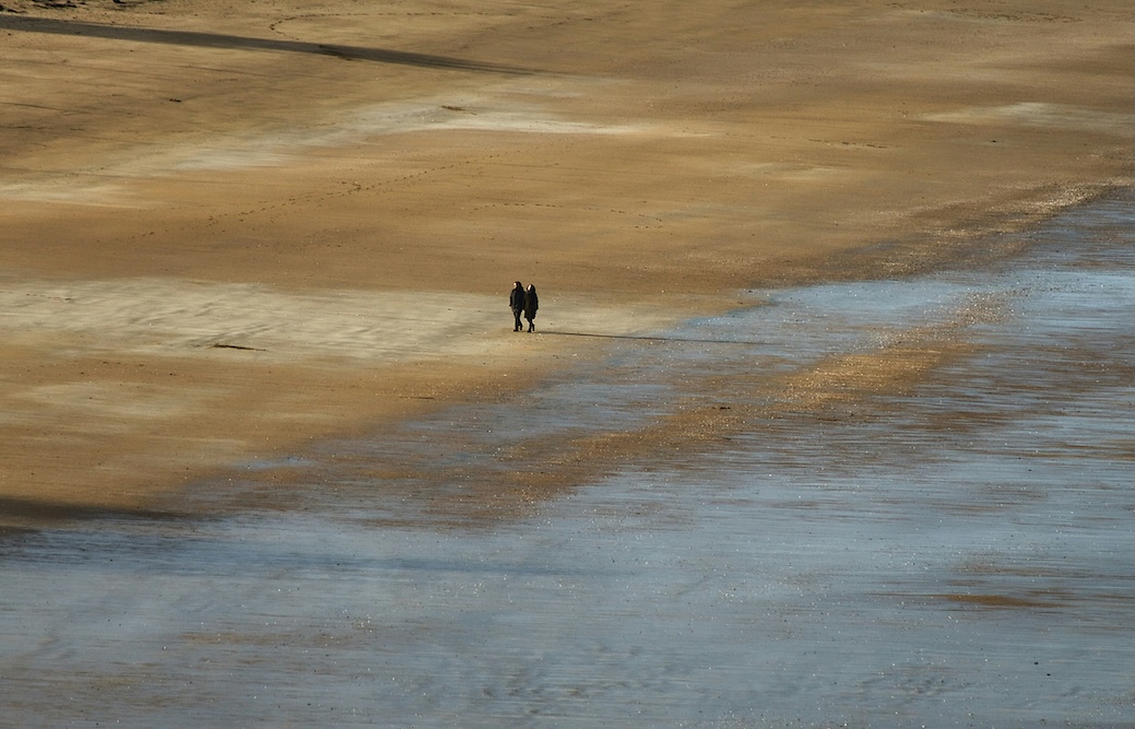 Solitary walk on the beach
